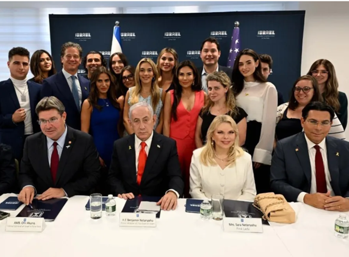 A group of people posing for a photo

AI-generated content may be incorrect.